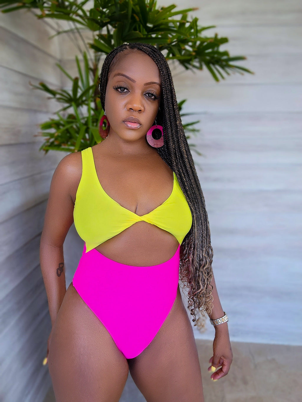 Pink and yellow swimsuit 2025